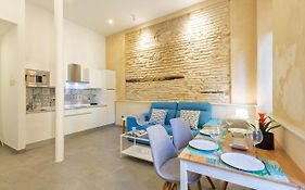 Nine O Clock San Agustin Suites